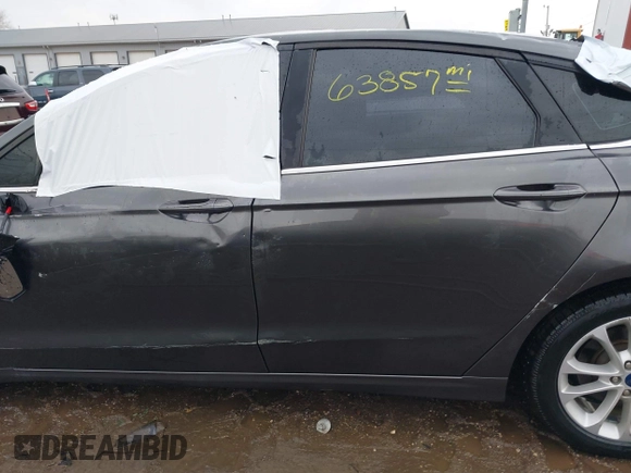 2020 Ford Fusion SE z VIN 3FA6P0LU6LR185721, wystawiony jako IAAI lot #41639827 z przebiegiem 63 857 mil mil oraz . Historia ofert i sprzedaży dostępna na DreamBid. Obrazek 14.