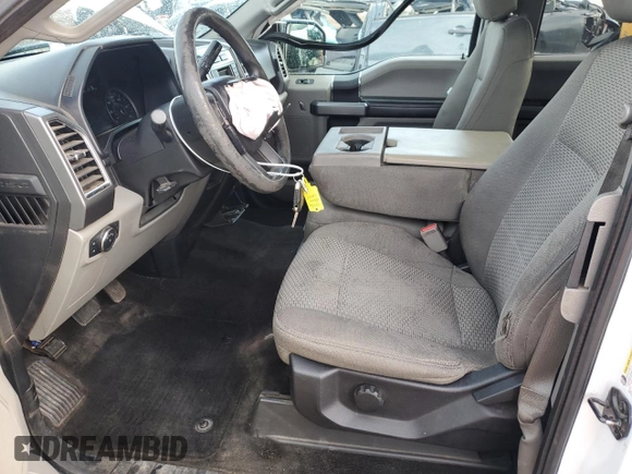 2015 Ford F-150 XLT with VIN 1FTFX1EF6FFA30750, listed as a Copart auction lot 60123375 with 210,315 mi miles and Salvage title. Bid and sale history available at DreamBid. Image 7.