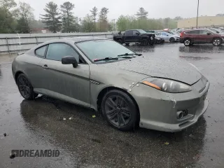 2008 Hyundai Tiburon GS z VIN KMHHM66D18U264820, wystawiony jako Copart lot #54485415 z przebiegiem 158 129 mil mil oraz Szkody całkowita. Historia ofert i sprzedaży dostępna na DreamBid. Obrazek 4.