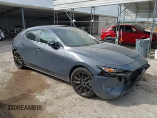 2023 Mazda 3 S Carbon Edition with VIN JM1BPBLM9P1611745, listed as a IAAI auction lot 42131035 with 23,877 mi miles and . Bid and sale history available at DreamBid. Image 1.