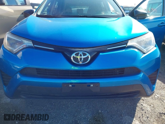 2016 Toyota RAV4 LE with VIN JTMBFREV2GD183811, listed as a IAAI auction lot 42216793 with 95,270 mi miles and . Bid and sale history available at DreamBid. Image 6.