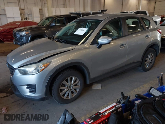 2016 Mazda CX-5 Sport with VIN JM3KE2BE5G0720507, listed as a IAAI auction lot 41872003 with 160,727 mi miles and . Bid and sale history available at carsss.com. Image 17.