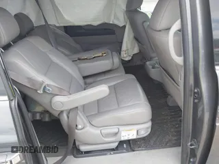 2012 Honda Odyssey Touring with VIN 5FNRL5H90CB045430, listed as a IAAI auction lot 42079770 with 113,901 mi miles and . Bid and sale history available at DreamBid. Image 8.