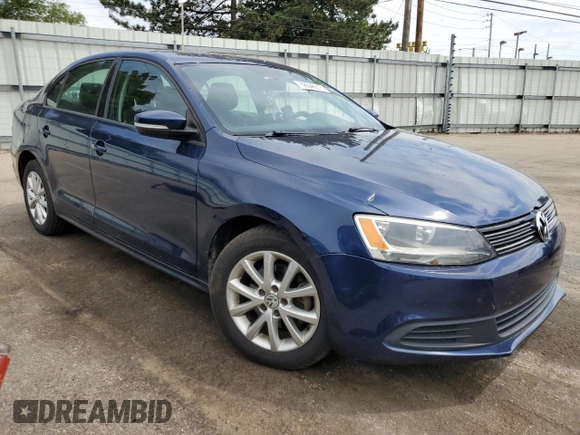 2011 Volkswagen Jetta SE with VIN 3VWDX7AJ8BM322833, listed as a Copart auction lot 56546615 with 140,808 mi miles and Salvage title. Bid and sale history available at DreamBid. Image 4.