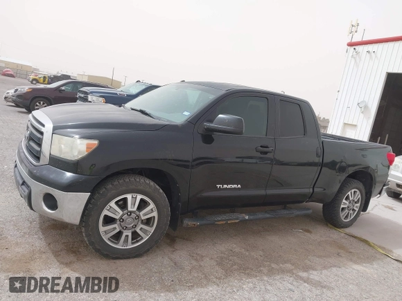 2013 Toyota Tundra z VIN 5TFRM5F19DX063197, wystawiony jako IAAI lot #41799886 z przebiegiem 351 859 mil mil oraz . Historia ofert i sprzedaży dostępna na DreamBid. Obrazek 14.