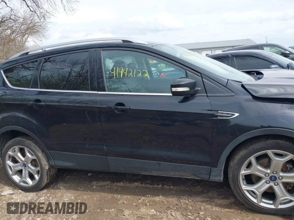 2019 Ford Escape Titanium with VIN 1FMCU9J91KUC42161, listed as a IAAI auction lot 41942122 with 100,677 mi miles and . Bid and sale history available at DreamBid. Image 13.