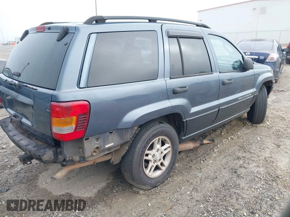 2002 Jeep Grand Cherokee Laredo z VIN 1J4GX48S62C201579, wystawiony jako IAAI lot #42102238 z przebiegiem 262 630 mil mil oraz . Historia ofert i sprzedaży dostępna na DreamBid. Obrazek 4.