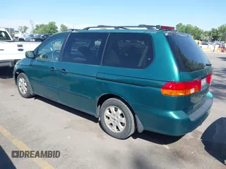2002 Honda Odyssey EX z VIN 2HKRL18632H582789, wystawiony jako IAAI lot #42481029 z przebiegiem 272 380 mil mil oraz . Historia ofert i sprzedaży dostępna na DreamBid. Obrazek 3.