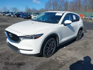 2017 Mazda CX-5 Grand Touring with VIN JM3KFBDL6H0188517, listed as a IAAI auction lot 41093178 with 98,831 mi miles. Bid and sale history available at carsss.com. Image 2.