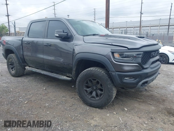 2022 Ram 1500 TRX with VIN 1C6SRFU98NN334983, listed as a IAAI auction lot 42010145 with 19,207 mi miles and . Bid and sale history available at DreamBid. Image 1.