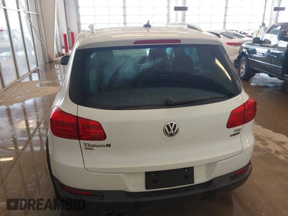 2016 Volkswagen Tiguan S with VIN WVGBV7AX0GW532236, listed as a IAAI auction lot 41610575 with 104,193 mi miles and . Bid and sale history available at DreamBid. Image 15.