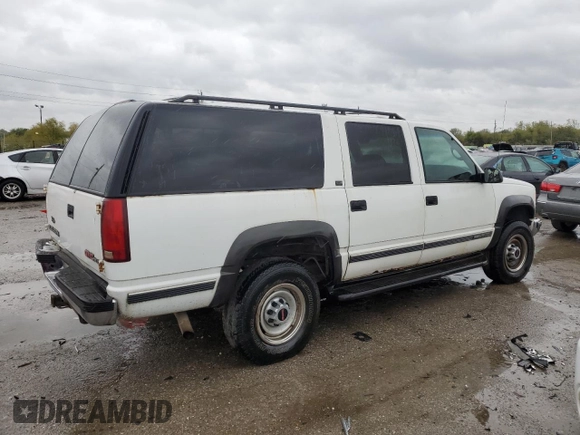 1997 GMC Suburban z VIN 1GKGK26JXVJ715765, wystawiony jako Copart lot #73188284 z przebiegiem 301 101 mil mil oraz Szkoda całkowita • Salvage title. Historia ofert i sprzedaży dostępna na DreamBid. Obrazek 3.