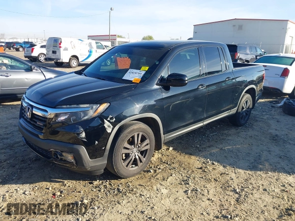 2019 Honda Ridgeline Sport with VIN 5FPYK2F12KB007990, listed as a IAAI auction lot 41828709 with 67,736 mi miles and . Bid and sale history available at DreamBid. Image 19.