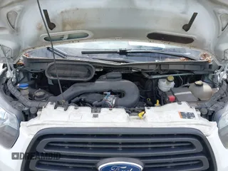 2019 Ford Transit with VIN 1FTYE1ZM3KKB46285, listed as a IAAI auction lot 42495117 with 234,622 mi miles and . Bid and sale history available at DreamBid. Image 10.