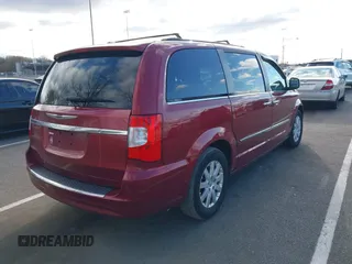 2012 Chrysler Town & Country Touring-L with VIN 2C4RC1CG3CR413148, listed as a IAAI auction lot 42040272 with 137,631 mi miles. Bid and sale history available at carsss.com. Image 4.