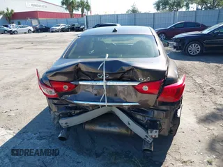 2015 Infiniti Q50 Premium z VIN JN1BV7AR3FM396882, wystawiony jako IAAI lot #37523335 z przebiegiem 89 761 mil mil oraz . Historia ofert i sprzedaży dostępna na DreamBid. Obrazek 15.