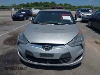 2012 Hyundai Veloster w/Gray Int z VIN KMHTC6ADXCU049918, wystawiony jako IAAI lot #42195897 z przebiegiem 206 033 mil mil oraz . Historia ofert i sprzedaży dostępna na DreamBid. Obrazek 6.