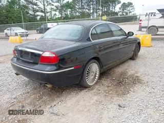 2005 Jaguar S-Type with VIN SAJWA01T05FN51342, listed as a IAAI auction lot 42047599 with 173,261 mi miles and . Bid and sale history available at DreamBid. Image 4.