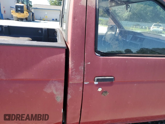 1991 Nissan Frontier XE with VIN 1N6SD11S2MC412375, listed as a Copart auction lot 61015515 with 201,629 mi miles and Salvage title. Bid and sale history available at DreamBid. Image 10.