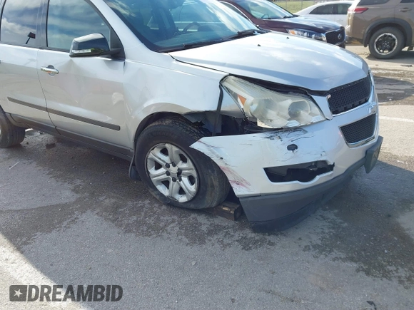 2012 Chevrolet Traverse LS z VIN 1GNKRFED7CJ330186, wystawiony jako IAAI lot #41806198 z przebiegiem 132 703 mil mil oraz . Historia ofert i sprzedaży dostępna na DreamBid. Obrazek 6.