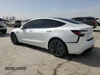 2025 Tesla Model 3 Long Range with VIN 5YJ3E1EB9SF902505, listed as a Copart auction lot 49849535 with 1,977 mi miles and Salvage Title. Bid and sale history available at DreamBid. Image 2.
