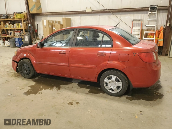 2010 Kia Rio with VIN KNADH4B39A6691792, listed as a Copart auction lot 80043064 with 161,139 mi miles and Salvage Title. Bid and sale history available at DreamBid. Image 2.