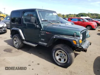 2000 Jeep Wrangler Sport with VIN 1J4FA49S4YP741154, listed as a Copart auction lot 71006864 with 200,684 mi miles and Clean Title. Bid and sale history available at carsss.com. Image 4.