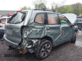 2017 Subaru Forester z VIN JF2SJABC4HH452602, wystawiony jako IAAI lot #42197639 z przebiegiem 141 385 mil mil oraz . Historia ofert i sprzedaży dostępna na DreamBid. Obrazek 6.