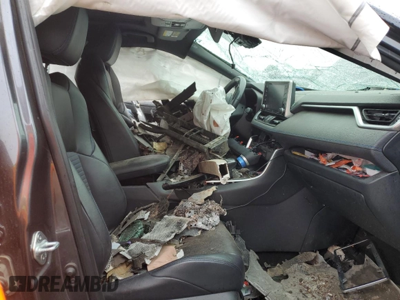 2019 Toyota RAV4 Hybrid XSE with VIN JTMEWRFV3KD517901, listed as a Copart auction lot 57329545 with Not provided miles and Salvage title. Bid and sale history available at DreamBid. Image 7.