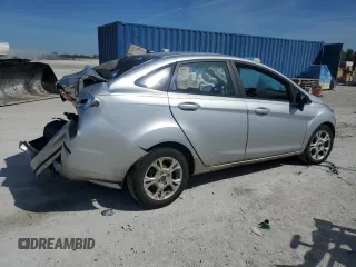 2015 Ford Fiesta SE z VIN 3FADP4BJ4FM219596, wystawiony jako Copart lot #44907085 z przebiegiem 104 629 mil mil oraz Szkoda całkowita • Salvage title. Historia ofert i sprzedaży dostępna na DreamBid. Obrazek 3.