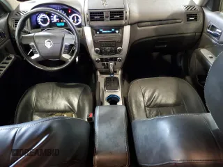 2011 Mercury Milan Premier with VIN 3MEHM0JA6BR602126, listed as a Copart auction lot 66953604 with 296,167 mi miles and Salvage title. Bid and sale history available at DreamBid. Image 8.