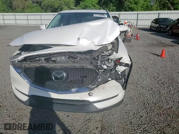 2017 Mazda CX-5 Grand Touring with VIN JM3KFADL1H0141132, listed as a Copart auction lot 51755095 with 116,220 mi miles and Salvage Title. Bid and sale history available at carsss.com. Image 12.