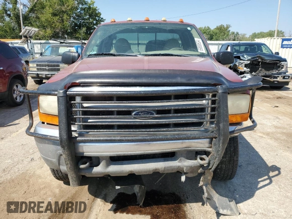 1999 Ford F-250 XL with VIN 1FTNX21SXXEE40026, listed as a Copart auction lot 69888634 with 215,535 mi miles and Salvage title. Bid and sale history available at DreamBid. Image 5.