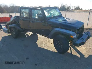 2021 Jeep Gladiator Sport S z VIN 1C6JJTAG4ML599463, wystawiony jako IAAI lot #41312938 z przebiegiem 169 189 mil mil oraz . Historia ofert i sprzedaży dostępna na DreamBid. Obrazek 1.