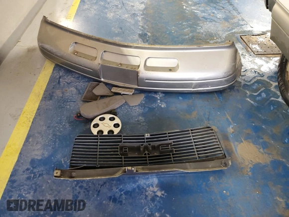2004 GMC Safari z VIN 1GKDM19X94B501222, wystawiony jako Copart lot #87334014 z przebiegiem 287 482 mil mil oraz Szkoda całkowita • Salvage title. Historia ofert i sprzedaży dostępna na DreamBid. Obrazek 13.