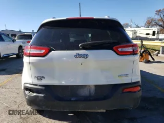 2016 Jeep Cherokee Altitude with VIN 1C4PJLCB7GW135235, listed as a Copart auction lot 80892474 with 201,458 mi miles and Salvage Title. Bid and sale history available at carsss.com. Image 6.