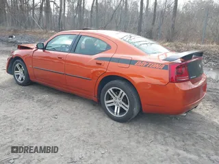 2006 Dodge Charger R/T with VIN 2B3KA53H76H233903, listed as a IAAI auction lot 42001071 with 75,417 mi miles and . Bid and sale history available at carsss.com. Image 3.