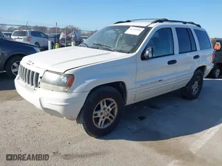 2004 Jeep Grand Cherokee Laredo with VIN 1J4GX48S84C206933, listed as a IAAI auction lot 41739364 with 257,893 mi miles. Bid and sale history available at carsss.com. Image 2.