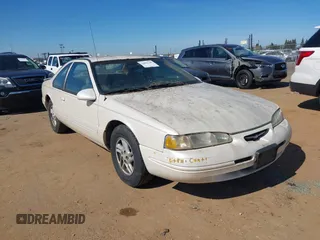 1996 Ford Thunderbird LX with VIN 1FALP62W3TH135238, listed as a IAAI auction lot 41692746 with 136,464 mi miles and . Bid and sale history available at DreamBid. Image 1.