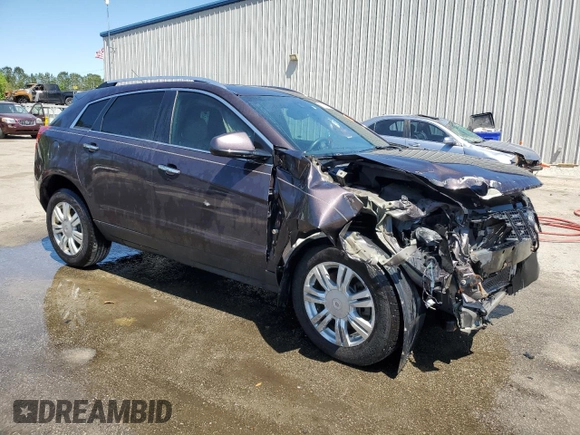 2015 Cadillac SRX Luxury Collection z VIN 3GYFNBE36FS606313, wystawiony jako Copart lot #52767735 z przebiegiem 91 480 mil mil oraz Szkody całkowita. Historia ofert i sprzedaży dostępna na DreamBid. Obrazek 4.