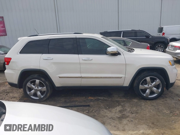 2012 Jeep Grand Cherokee Overland with VIN 1C4RJECT5CC362349, listed as a IAAI auction lot 41760221 with 218,350 mi miles. Bid and sale history available at carsss.com. Image 13.