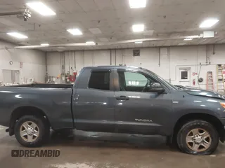 2010 Toyota Tundra 4WD Truck with VIN 5TFUM5F16AX006879, listed as a IAAI auction lot 40447273 with 219,498 mi miles. Bid and sale history available at carsss.com. Image 13.
