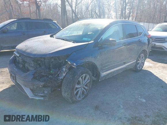 2020 Honda CR-V Touring with VIN 2HKRW2H9XLH605106, listed as a IAAI auction lot 41434008 with Not Provided miles and . Bid and sale history available at DreamBid. Image 18.