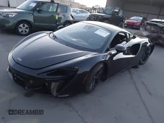 2023 McLaren Artura z VIN SBM16AEA4PW001449, wystawiony jako IAAI lot #41347791 z przebiegiem 4703 mil mil oraz . Historia ofert i sprzedaży dostępna na DreamBid. Obrazek 2.