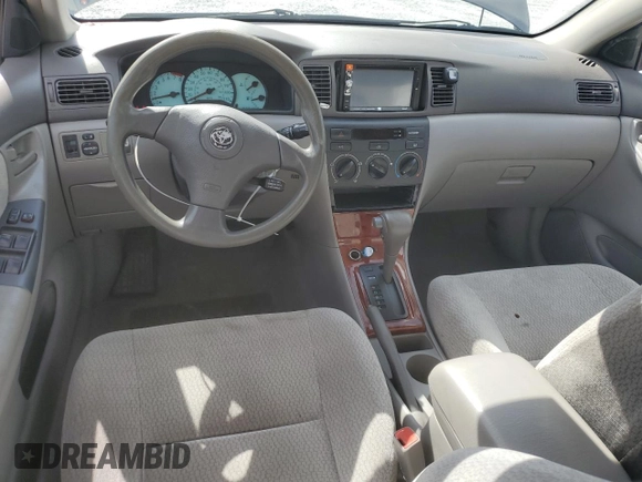 2004 Toyota Corolla CE with VIN 1NXBR38E74Z335430, listed as a Copart auction lot 51757685 with 299,999 mi miles and Salvage Title. Bid and sale history available at DreamBid. Image 8.