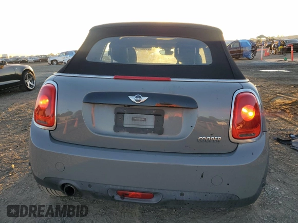 2017 MINI Convertible Cooper with VIN WMWWG5C35H3D00104, listed as a Copart auction lot 80680444 with 33,581 mi miles and Salvage title. Bid and sale history available at DreamBid. Image 6.