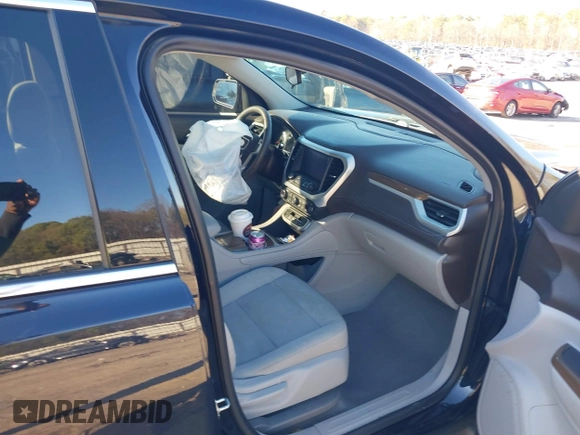 2021 GMC Acadia SLE with VIN 1GKKNKLA9MZ136112, listed as a IAAI auction lot 41212337 with 76,827 mi miles and . Bid and sale history available at DreamBid. Image 5.