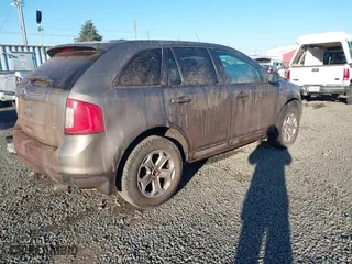 2013 Ford Edge SEL with VIN 2FMDK4JC5DBA97837, listed as a IAAI auction lot 41549296 with 128,943 mi miles. Bid and sale history available at carsss.com. Image 4.
