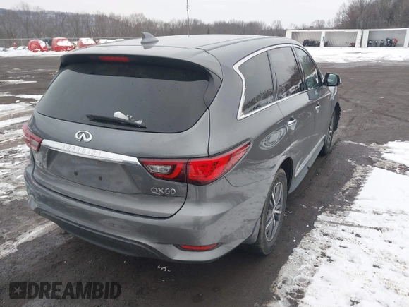 2019 Infiniti QX60 Luxe with VIN 5N1DL0MM3KC532832, listed as a IAAI auction lot 41576352 with 68,691 mi miles and . Bid and sale history available at DreamBid. Image 4.