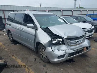 2010 Honda Odyssey EX-L z VIN 5FNRL3H78AB036216, wystawiony jako IAAI lot #42115792 z przebiegiem 234 057 mil mil oraz . Historia ofert i sprzedaży dostępna na DreamBid. Obrazek 1.